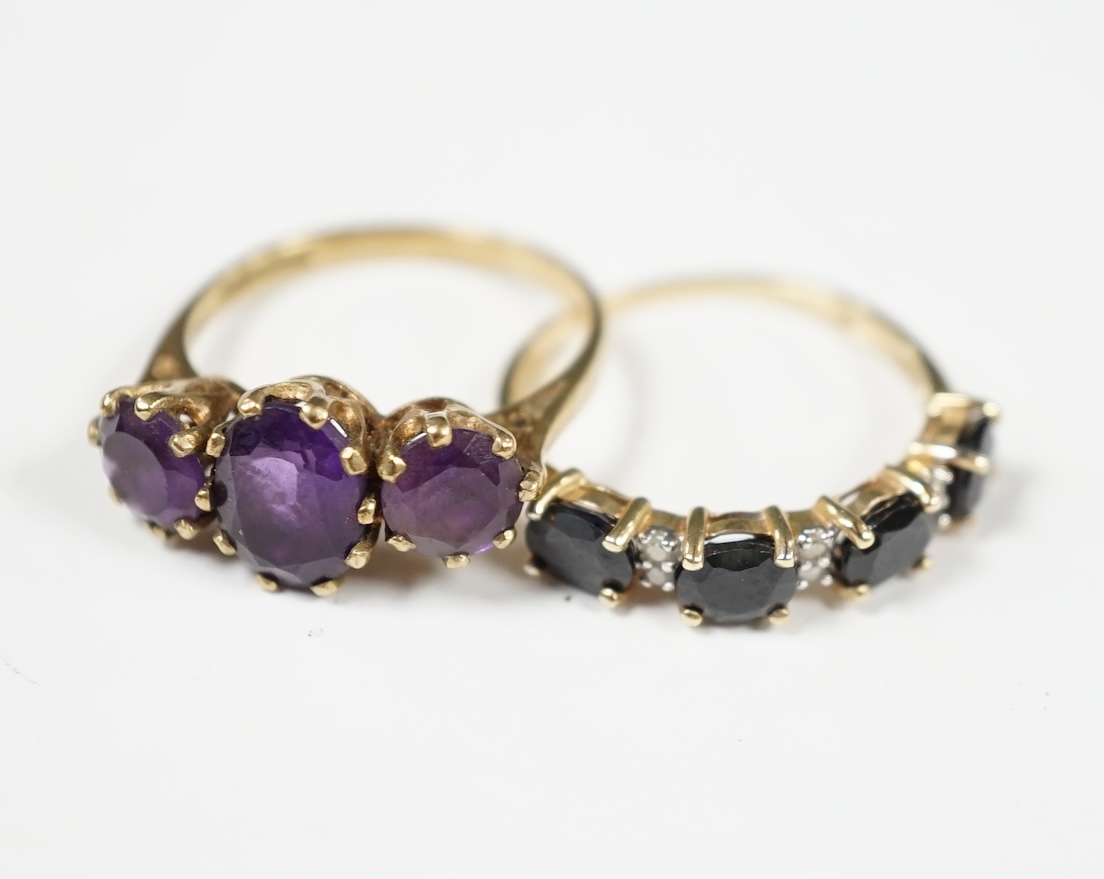 Two modern 9ct gold and gem set rings including three stone amethyst, size O and sapphire and diamond chip half hoop, gross weight 4.9 grams. Condition - fair
